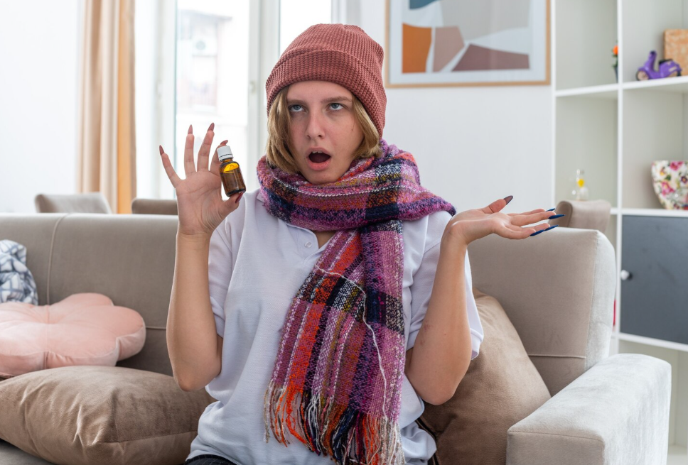Stressed person holding their head, Cold sore appearing on the lip during stress, Relaxation practice like yoga or meditation